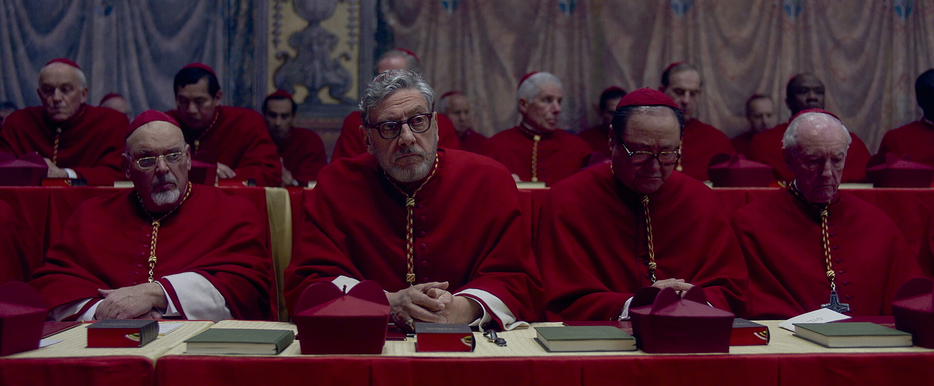 A group of bishops sitting at tables