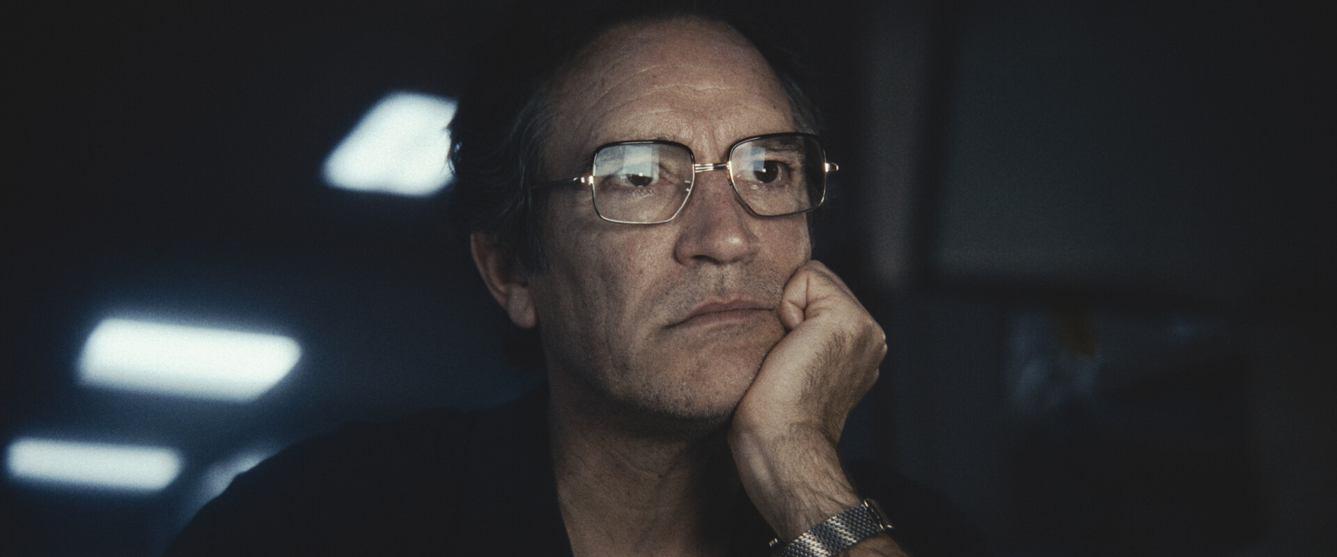 close up of a man with glasses